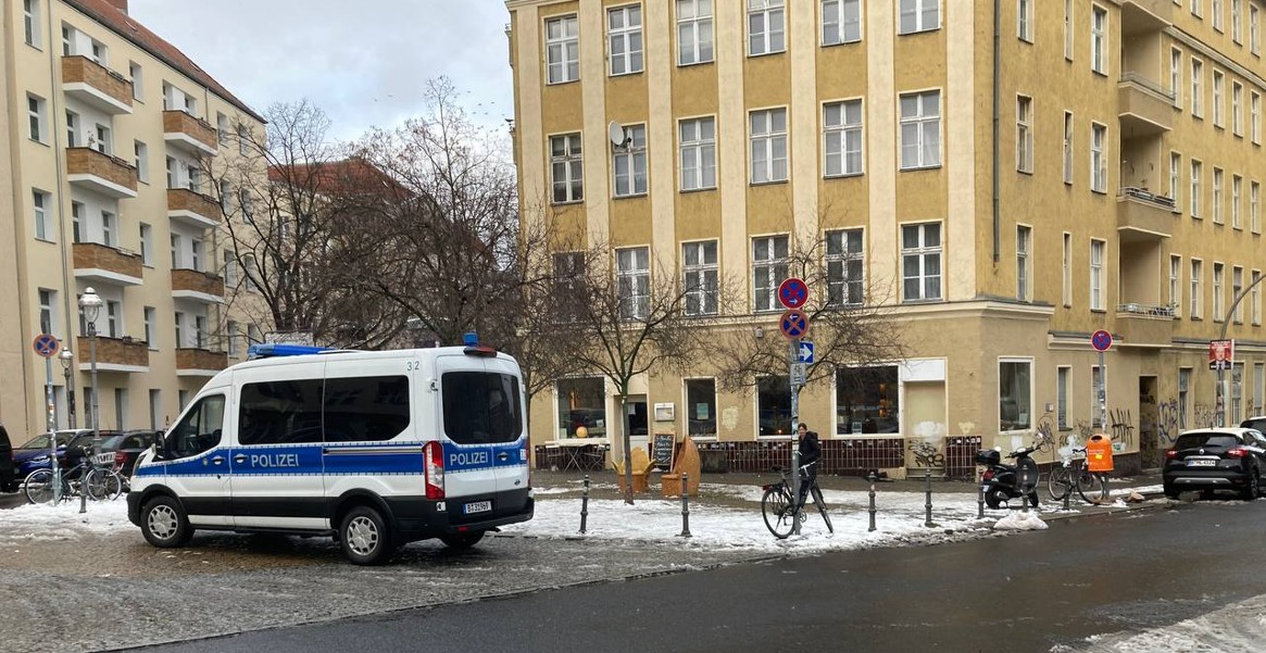 The sure sign of a leftist bar, cops sitting outside of Bajszel. Photo by the author.