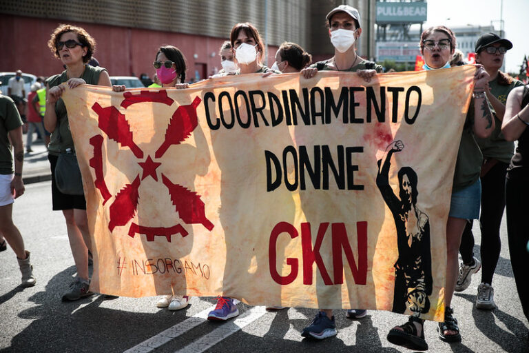 A demo by Italian GKN workers holding a banner which reads "Coordinamento donne GKN"