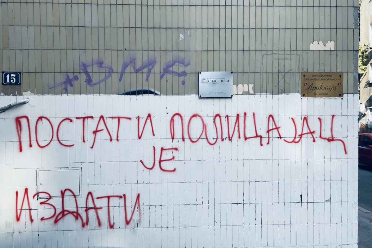 Graffiti translated to, "To become a policeman is to betray."