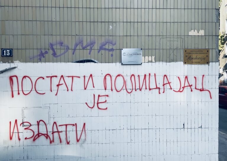 Graffiti translated to, "To become a policeman is to betray."