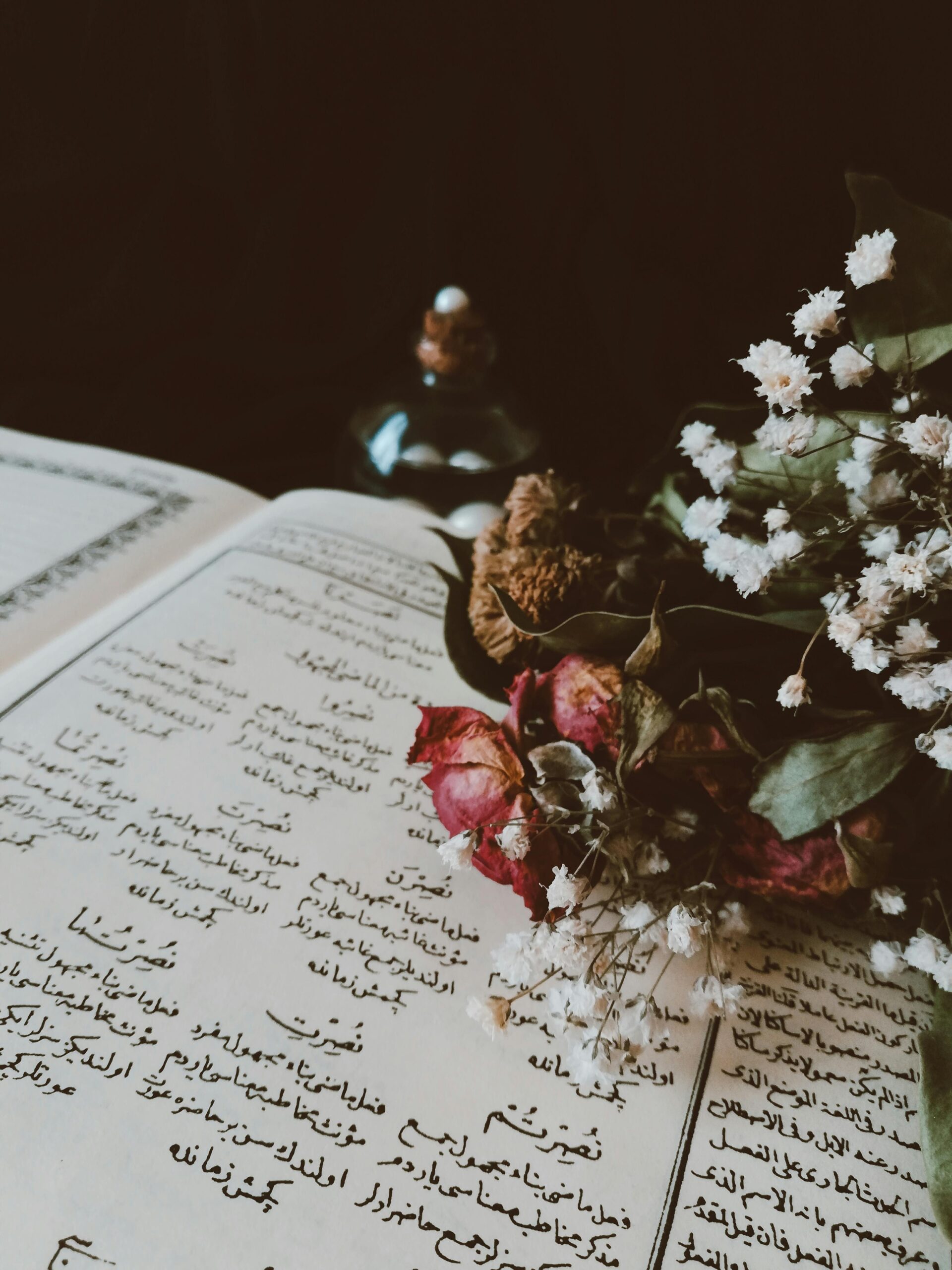 Dried Flowers on Top of Paper
