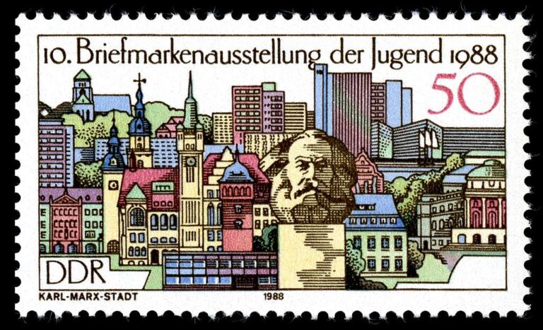 DDR stamp featuring the bust of Karl Marx with a colorful cityscape in the background.